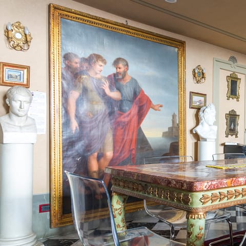 Walls covered in oil paintings