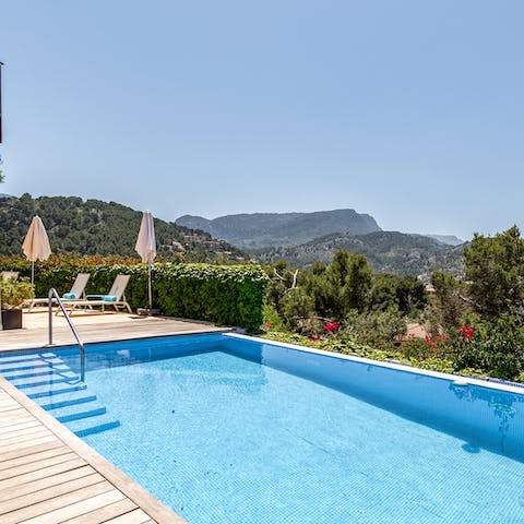 Swim in the pool under the glow of the summer sun