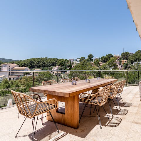 Sip sangria on the deluxe wooden table