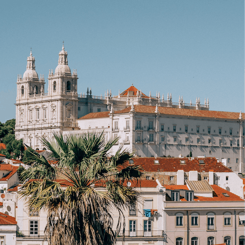 Stay in the historic Alfama district, the birthplace of Fado music
