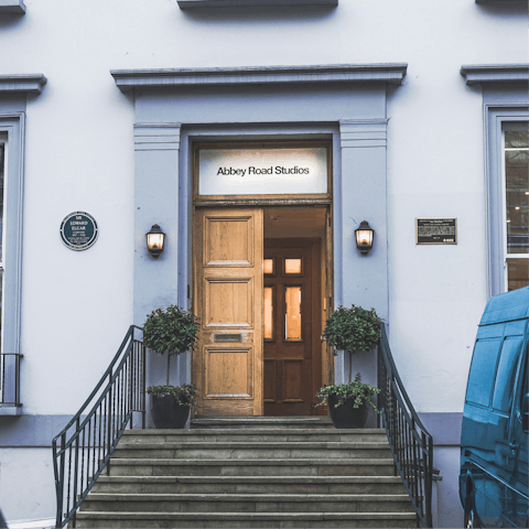 Recreate the famous album cover at Abbey Road, a short walk away