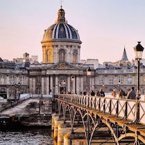 Cross the Seine at Pont des Arts