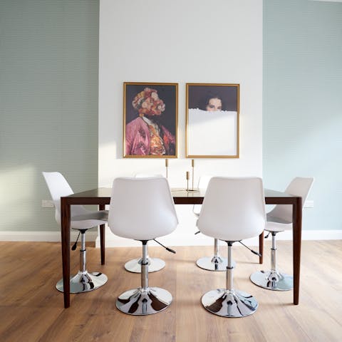 Enjoy a delicious meal around the dining table