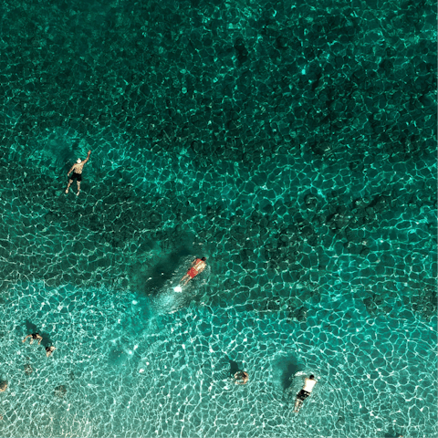 Stay steps from the azure waters of Karvuono beach