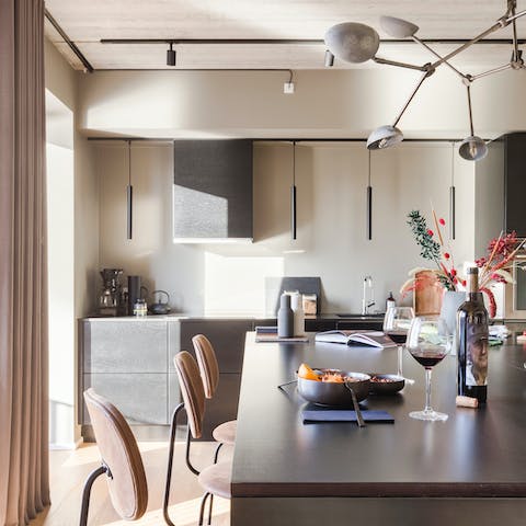 Plate up perfection in the sleek kitchen, or hire a chef that can