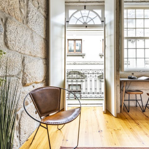 Pull up a chair and take in the views –⁠ glass of the city's famous Port optional