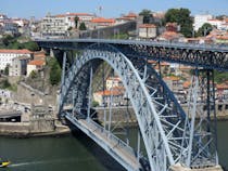 Cross the photogenic Dom Luís I Bridge