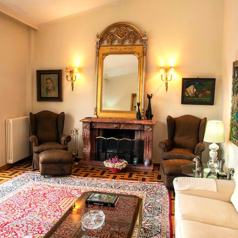 Curl up by the fireplace on a cosy evening with a good book and a glass of wine