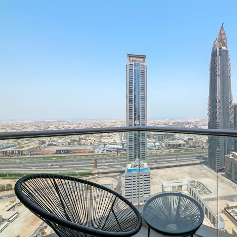Wake up with a cup of Arabic coffee on the private balcony
