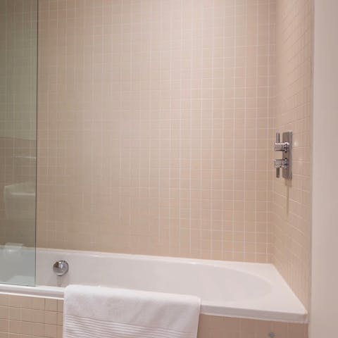 Soak in one of the two bathtubs