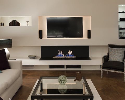 Enjoy cosy evenings by the fireplace