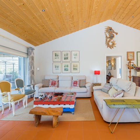 Enjoy seamless indoor-outdoor living as you unwind in the bright and comfortable interior
