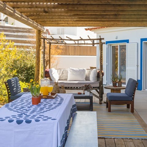 Seek shelter from the midday sun on the covered terrace