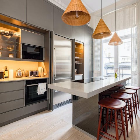 Rustle up a delicious roast dinner in the sleek modern kitchen