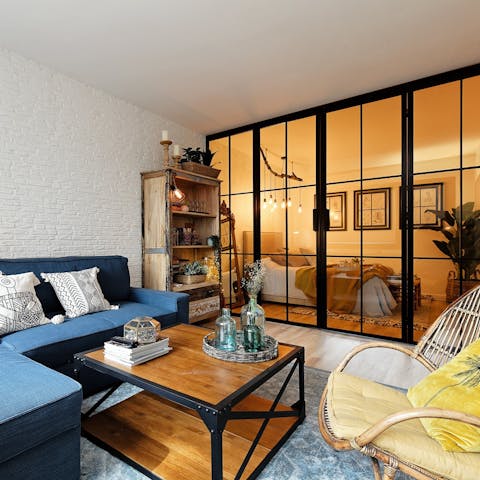 Unwind with a siesta in your glass-framed bedroom