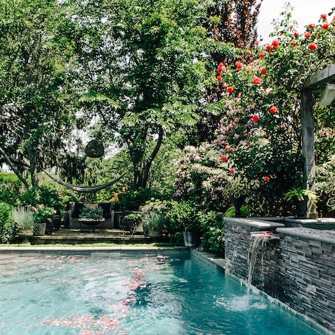 A gorgeous swimming pool and hot tub