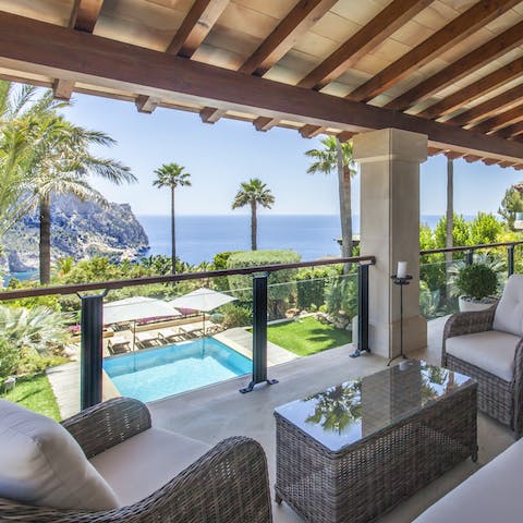Seek shelter from the midday sun up on the balcony, with breathtaking ocean views
