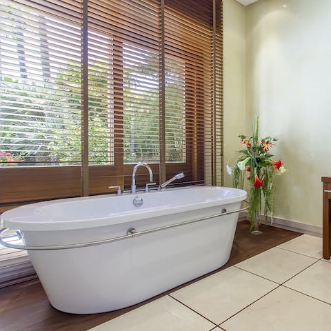 Relax and unwind in the lavish en-suite bathrooms