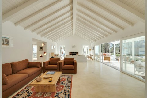Gather in the soaring living space that flows straight outdoors