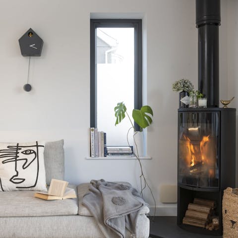 Run back to the home after a dip in the sea and get toasty next to the log burner