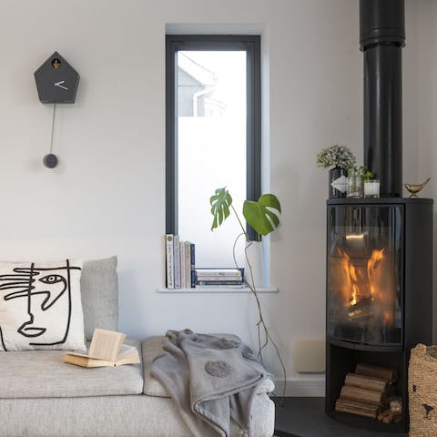 Run back to the home after a dip in the sea and get toasty next to the log burner