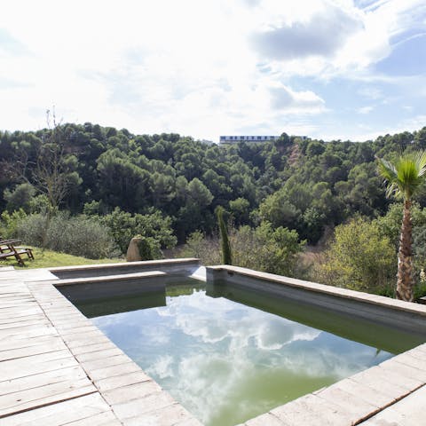Admire the scenery from the luxury of the pool