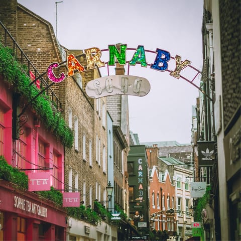 Explore Soho before shopping along Carnaby Street, a five-minute walk away