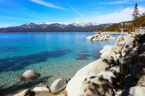 Take a trip to Lake Tahoe with its turquoise waters and mountain backdrop