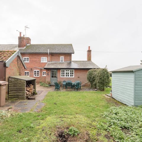 Embrace alfresco living with the barbecue, fire pit and heater in the garden
