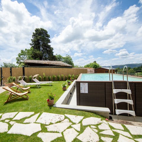 Spend the afternoon swimming in the above-ground pool