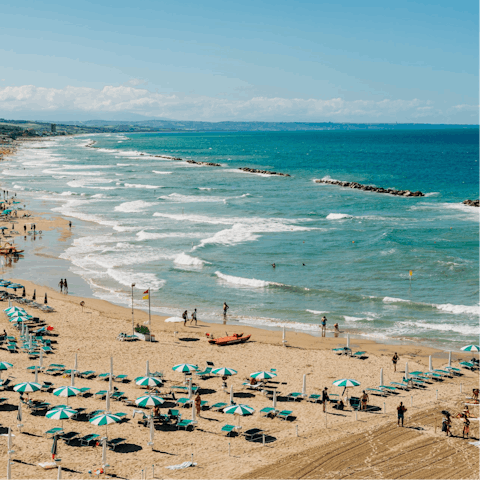 Swim in the sea at La Feniglia – it's a short drive away