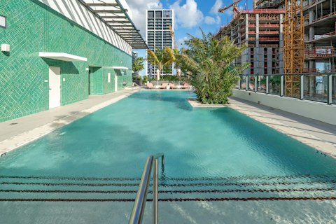 Look forward to a dip in the communal rooftop pool