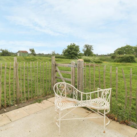 Enjoy a tipple while admiring the countryside views