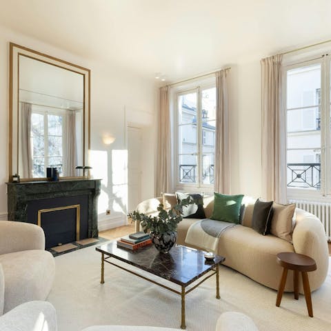 Relax in the chic living area after sightseeing around Paris