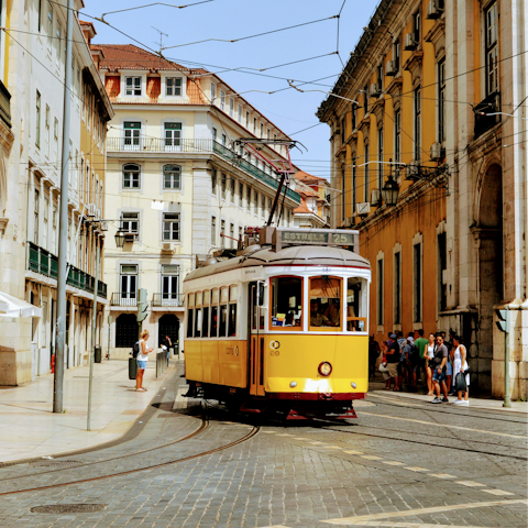 Ride Lisbon’s famous yellow trams through the city’s historic streets and viewpoints