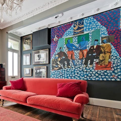Admire the quirky artwork from the comfort of your sofa