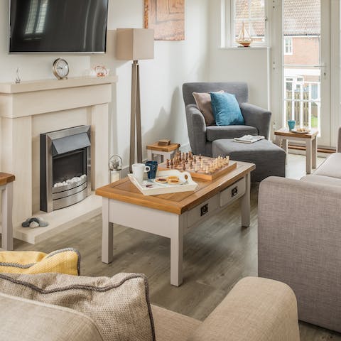 Cosy up in front of the fireplace
