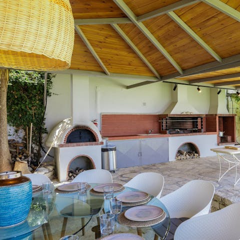 Fire up the pizza oven and get together for alfresco evening meals