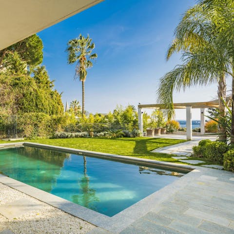 Spend blissful days by the pool or wander to the beach