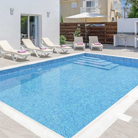 Make a splash in the private swimming pool