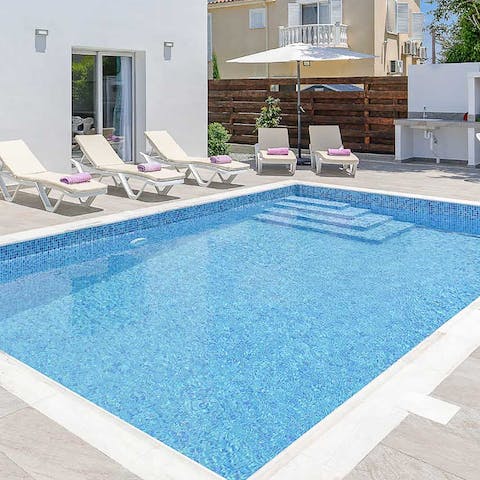 Make a splash in the private swimming pool