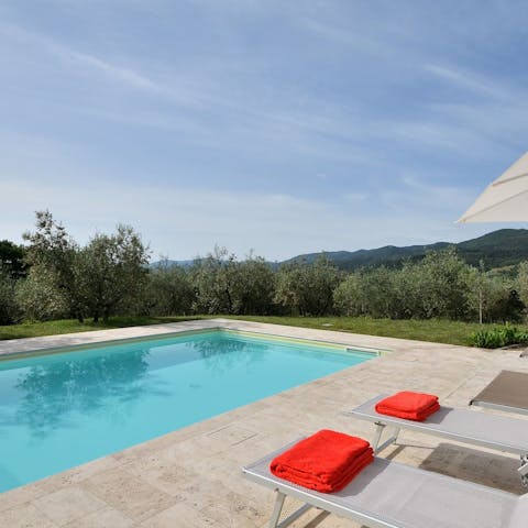 Swim in the private pool as the sun warms your skin