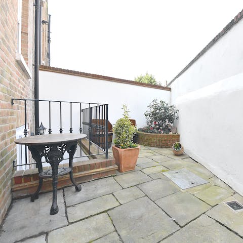 Take five and enjoy your morning coffee on the outside patio