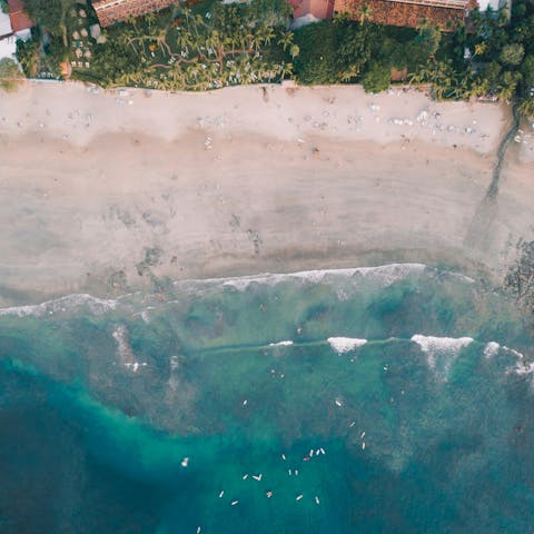Stroll to Tamarindo Beach to swim, surf, and savour the scenery