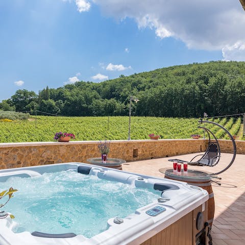 Soak away the stress in the hot tub (best enjoyed with an Aperol Spritz)