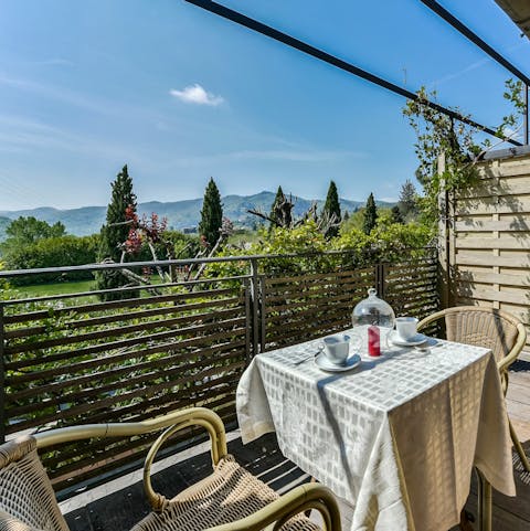 Sit out with a drink  on one of the private bedroom balconies