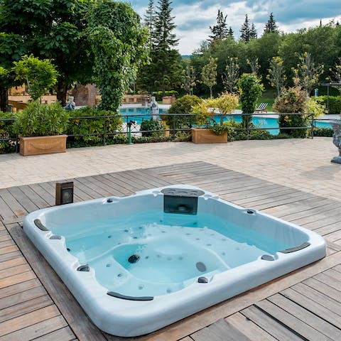 Relax and unwind in the private hot tub