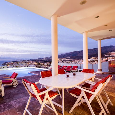 Dine alfresco in the shade of the terrace and look out over stunning views