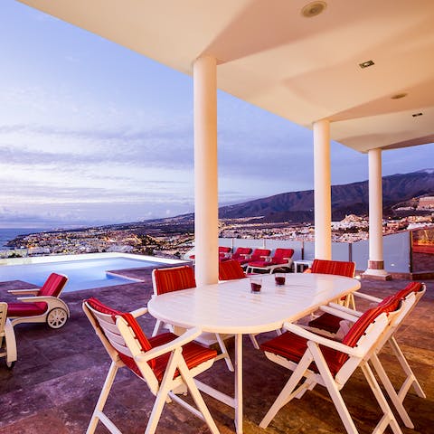 Dine alfresco in the shade of the terrace and look out over stunning views