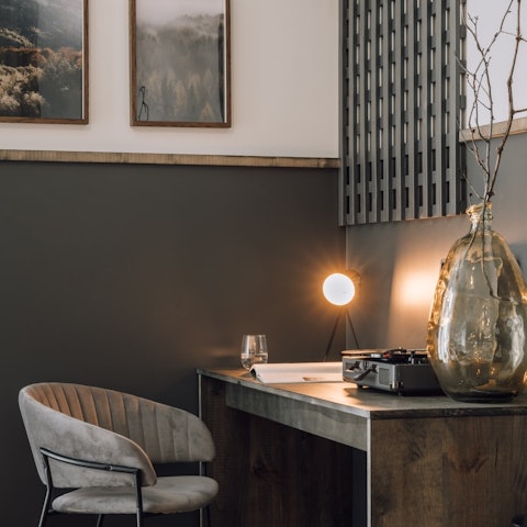 Catch up on work emails at the desk in the living area